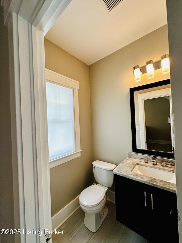 438 S Hite Ave, Louisville, KY 40206 - half bathroom with vanity and wood finished floors