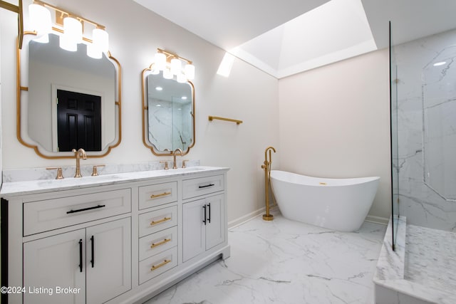 bathroom featuring a sink, a freestanding bath, marble finish floor, a marble finish shower, and double vanity