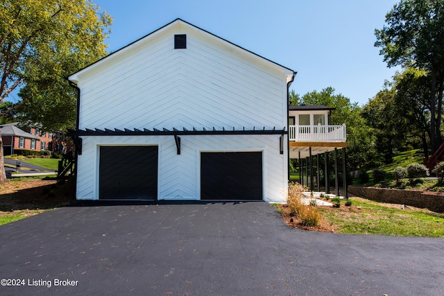 view of home's exterior with a garage