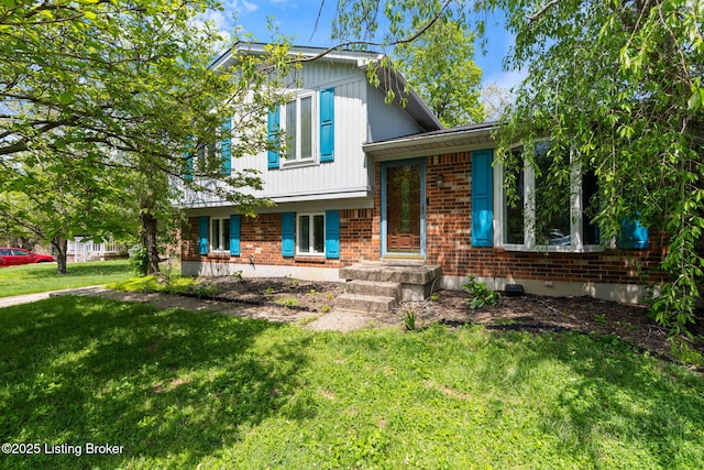 10207 El Coco Ct, Louisville, KY 40291 - split level home featuring brick siding and a front lawn