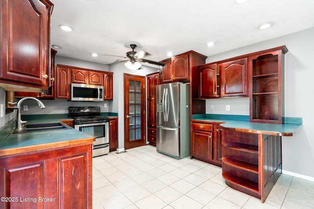 10207 El Coco Ct, Louisville, KY 40291 - kitchen featuring appliances with stainless steel finishes, open shelves, reddish brown cabinets, a ceiling fan, and recessed lighting