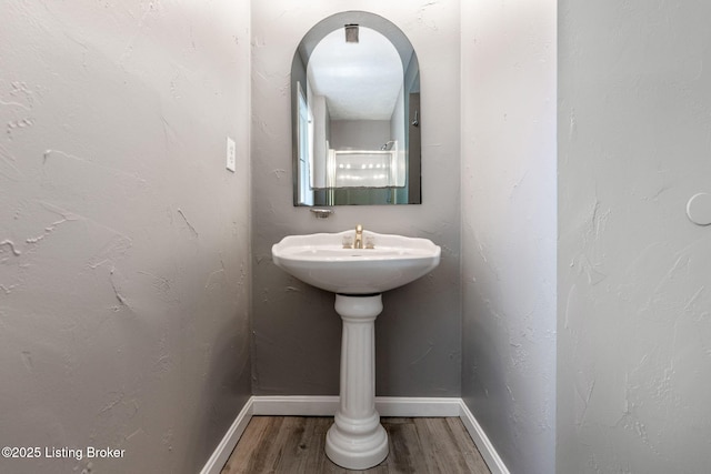 10207 El Coco Ct, Louisville, KY 40291 - bathroom featuring wood finished floors and baseboards