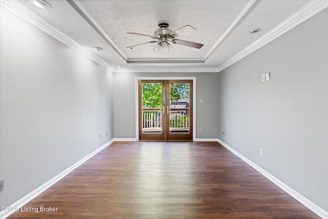 10207 El Coco Ct, Louisville, KY 40291 - spare room with a tray ceiling, ceiling fan, dark wood finished floors, crown molding, and a textured ceiling