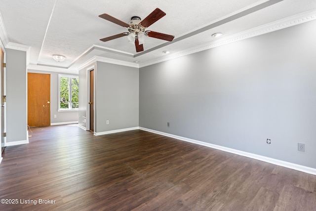 10207 El Coco Ct, Louisville, KY 40291 - empty room featuring ceiling fan, dark wood-style floors, crown molding, and a raised ceiling