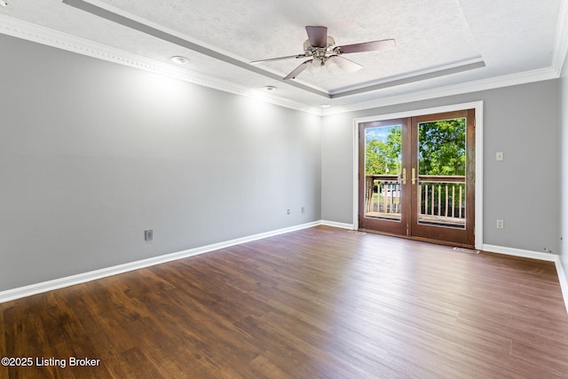 10207 El Coco Ct, Louisville, KY 40291 - spare room with a raised ceiling, french doors, dark wood-type flooring, ceiling fan, and a textured ceiling