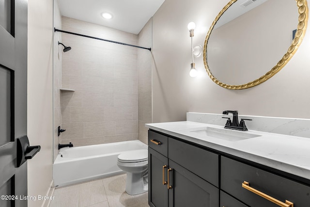 full bath featuring toilet, visible vents, vanity, shower / washtub combination, and tile patterned floors