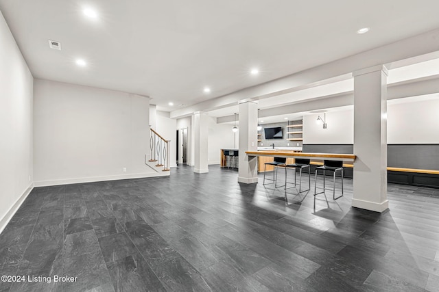 living room featuring visible vents, stairway, baseboards, and recessed lighting