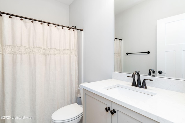 full bath with vanity and toilet