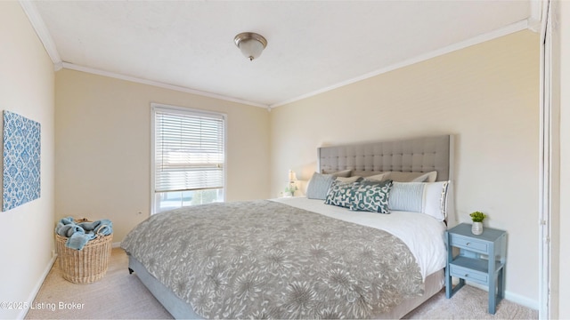 carpeted bedroom featuring baseboards and ornamental molding