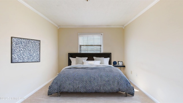 bedroom featuring carpet flooring, baseboards, and ornamental molding