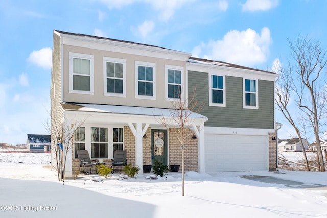 view of front of home with an attached garage, a porch, and brick siding