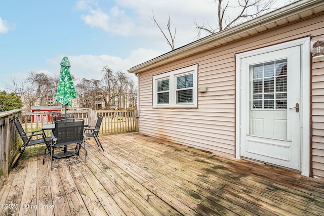 deck featuring outdoor dining space