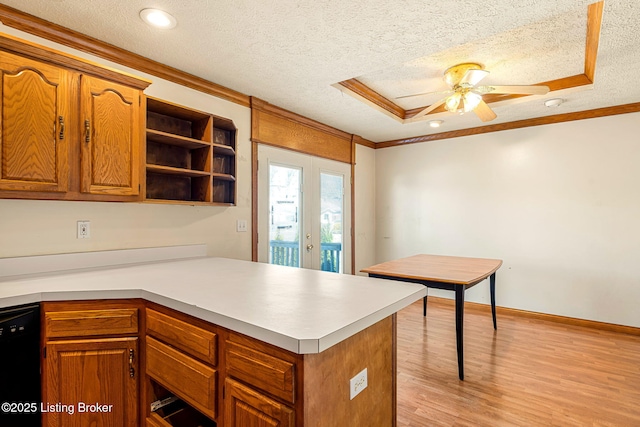 kitchen featuring a peninsula, light wood-style floors, ornamental molding, dishwasher, and open shelves