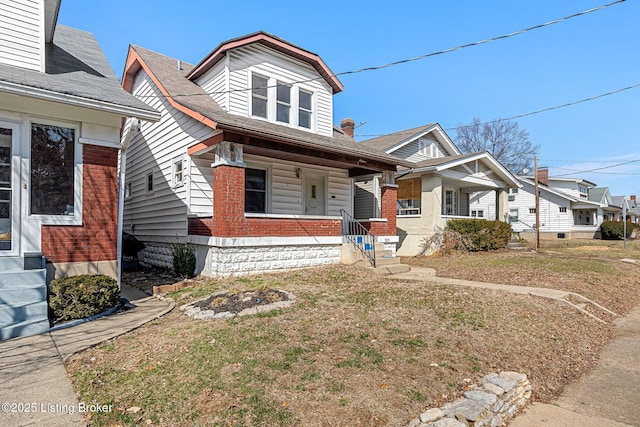 bungalow-style home with a porch