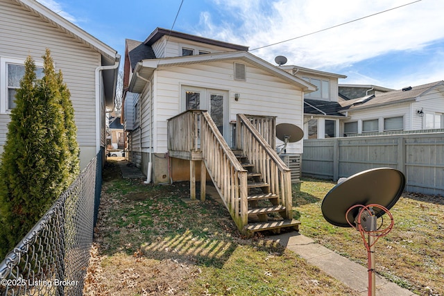 exterior space featuring a fenced backyard