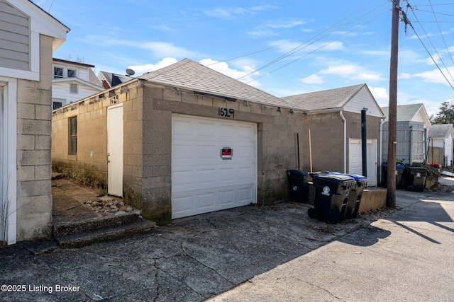 garage featuring driveway