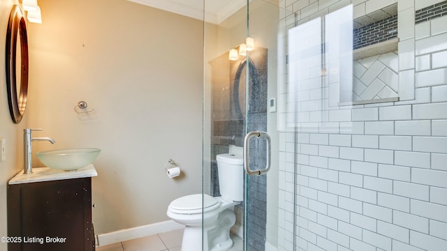 full bathroom with toilet, tile patterned flooring, crown molding, vanity, and a shower stall