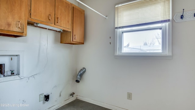 clothes washing area featuring washer hookup, cabinet space, and gas dryer hookup