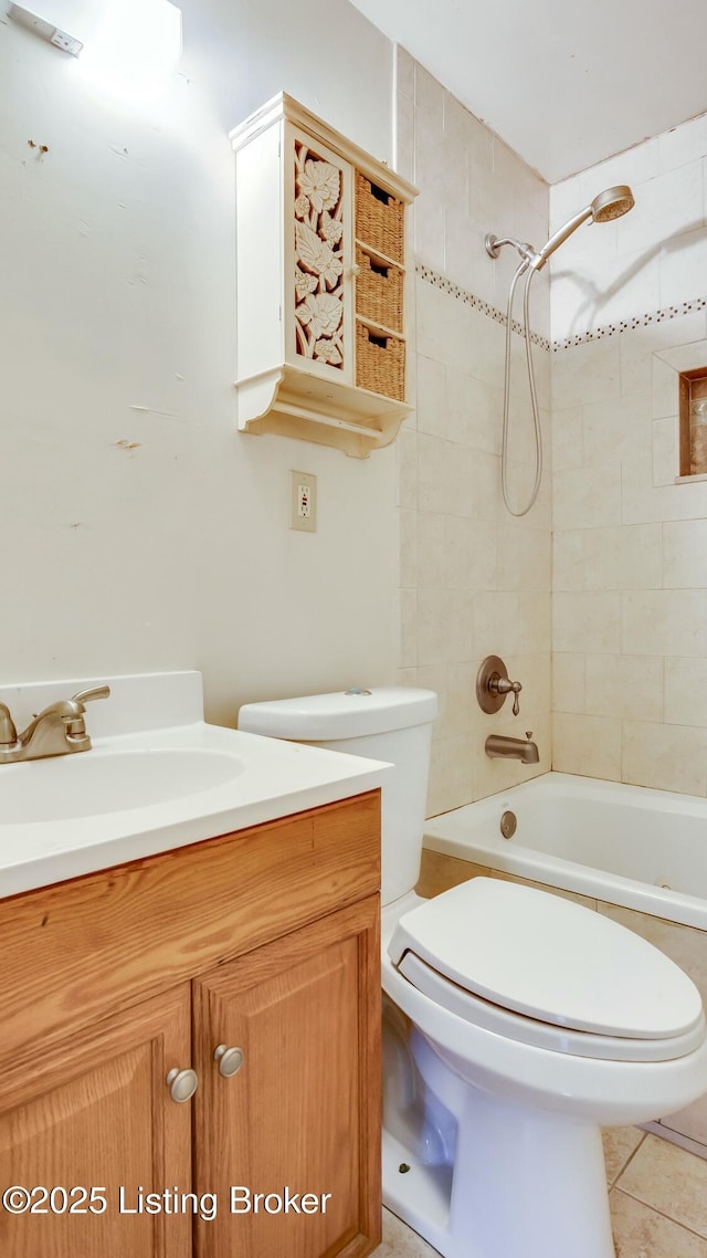 full bathroom with shower / washtub combination, tile patterned flooring, vanity, and toilet