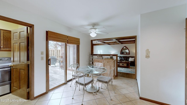 dining room featuring light tile patterned flooring, coffered ceiling, a ceiling fan, baseboards, and beamed ceiling