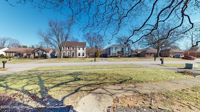 view of yard featuring a residential view