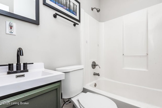 full bathroom with vanity, bathing tub / shower combination, and toilet