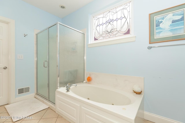 full bath featuring tile patterned flooring, visible vents, a shower stall, and a jetted tub