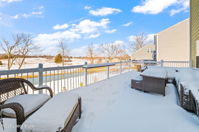 view of snow covered deck