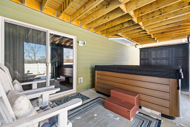 view of patio featuring a hot tub