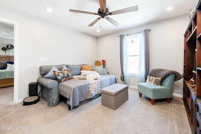 bedroom with recessed lighting, light carpet, and baseboards