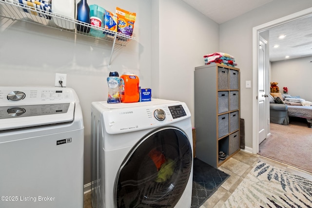 clothes washing area with light carpet, laundry area, baseboards, washing machine and clothes dryer, and recessed lighting