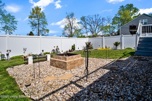 519 Williamsburg Dr, Mt Washington, KY 40047 - view of yard with a fenced backyard, a wooden deck, and a garden