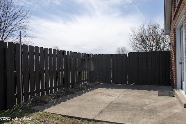 view of patio featuring a fenced backyard