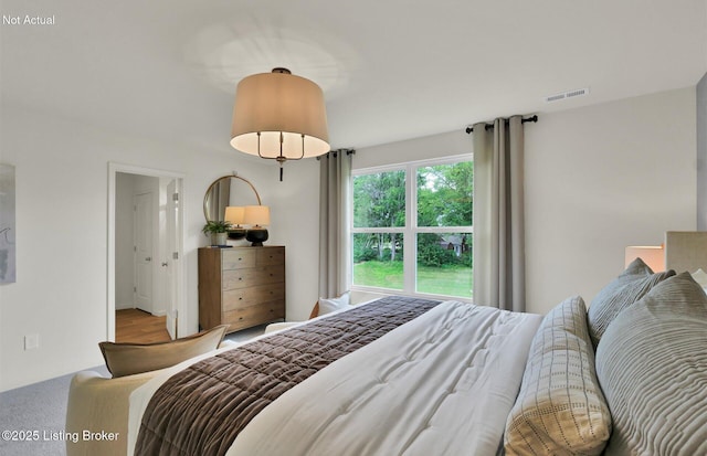 bedroom with visible vents