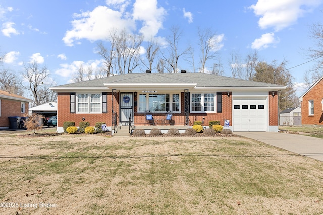 single story home with concrete driveway, brick siding, and a front yard