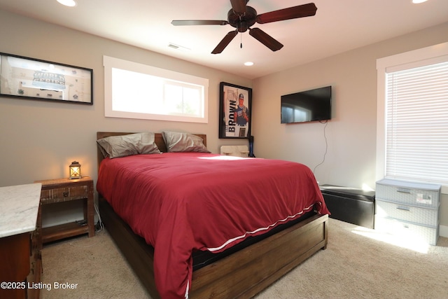 bedroom with recessed lighting, a ceiling fan, and light colored carpet