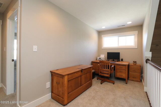 office area featuring light colored carpet, visible vents, baseboards, and recessed lighting