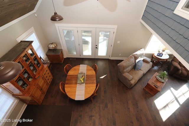 living room with ceiling fan, french doors, dark wood-style flooring, and baseboards