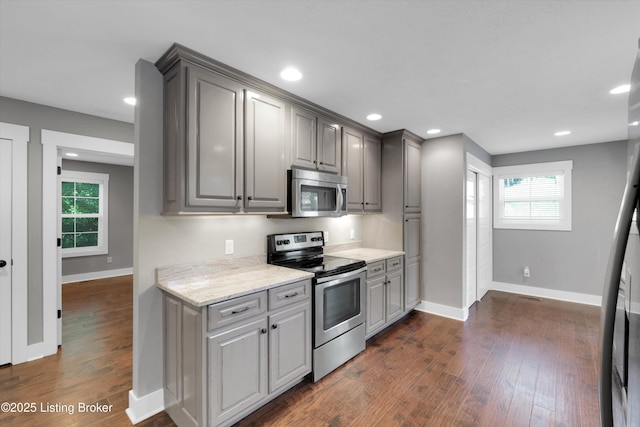 170 Moutardier Woods Way, Leitchfield, KY 42754 - kitchen featuring appliances with stainless steel finishes, gray cabinets, baseboards, healthy amount of natural light, and recessed lighting