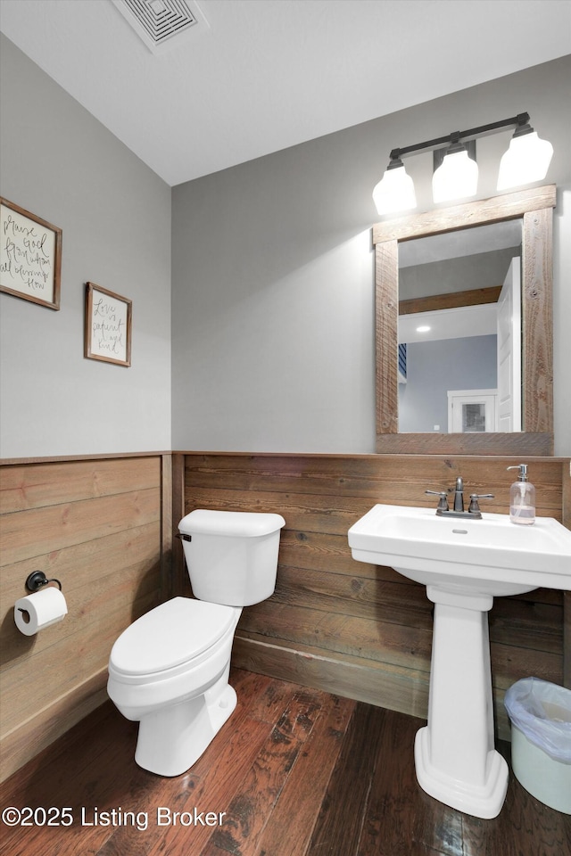 170 Moutardier Woods Way, Leitchfield, KY 42754 - bathroom featuring toilet, hardwood / wood-style floors, wainscoting, and a sink