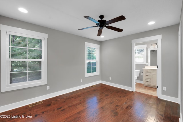 170 Moutardier Woods Way, Leitchfield, KY 42754 - unfurnished bedroom with multiple windows, dark wood-type flooring, recessed lighting, baseboards, and ceiling fan