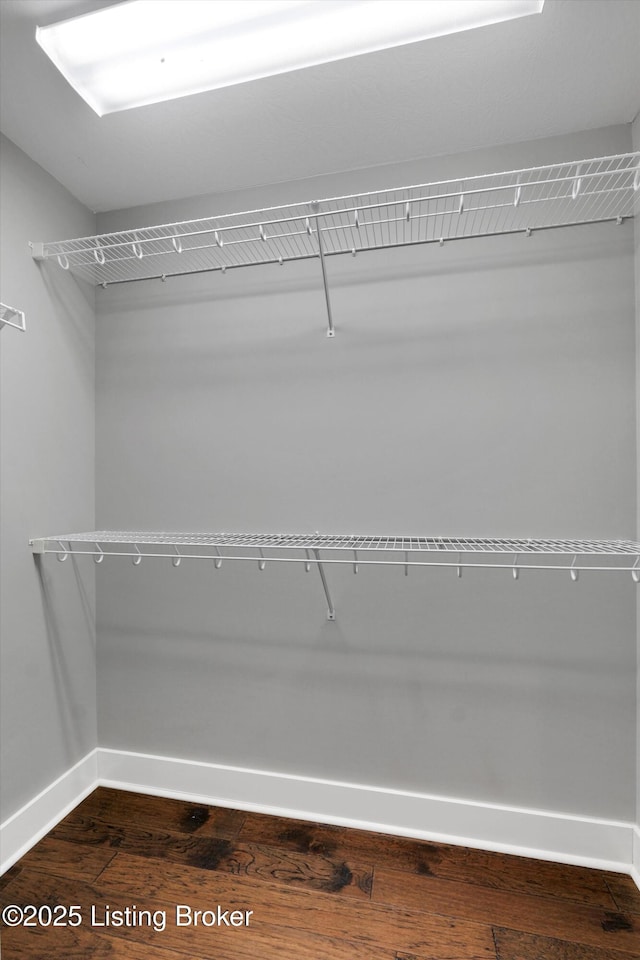 170 Moutardier Woods Way, Leitchfield, KY 42754 - spacious closet with dark wood-style flooring