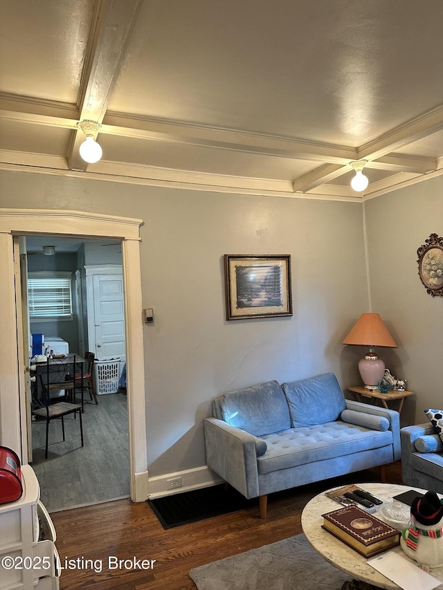 living area with dark wood-style floors, coffered ceiling, beam ceiling, and baseboards