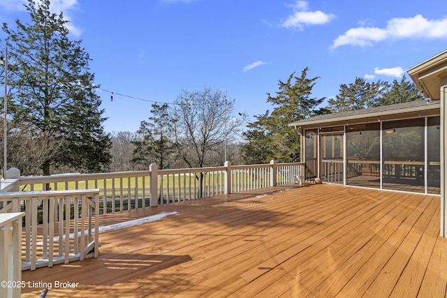 deck with a sunroom