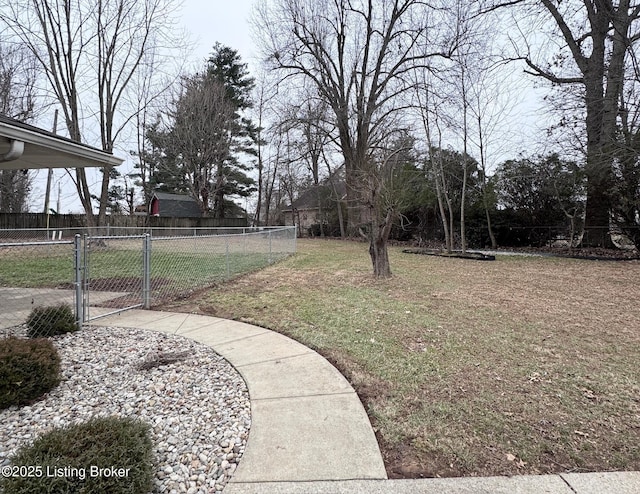 view of yard with a gate and fence