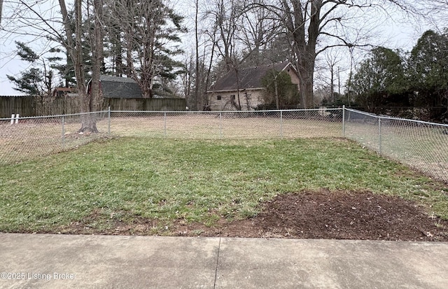 view of yard with a fenced backyard