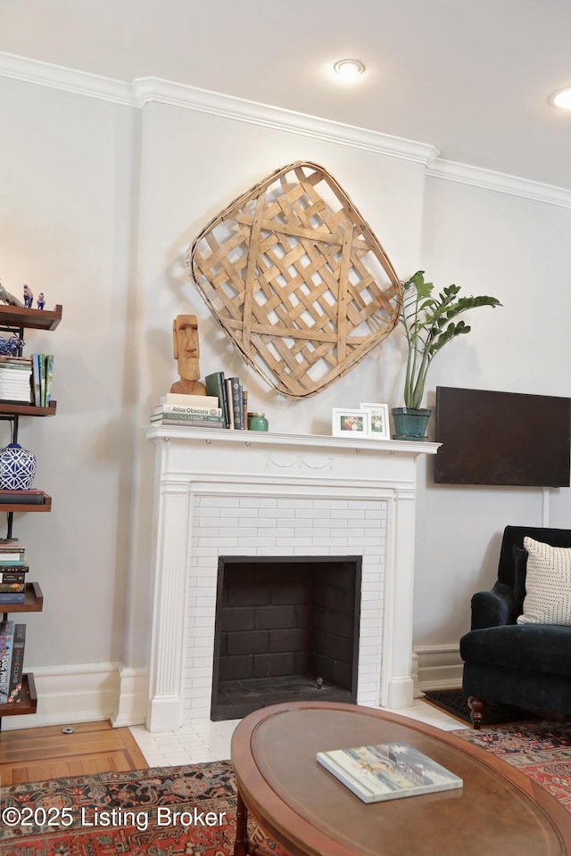 room details with a fireplace, crown molding, and baseboards