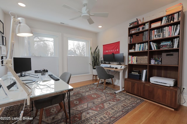 home office featuring ceiling fan, visible vents, wood finished floors, and recessed lighting