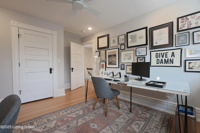 home office featuring ceiling fan, baseboards, wood finished floors, and recessed lighting