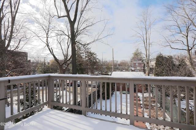 view of snow covered deck